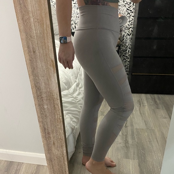 Lululemon tights with mesh cut outs. Size 10. Used - Picture 4 of 5